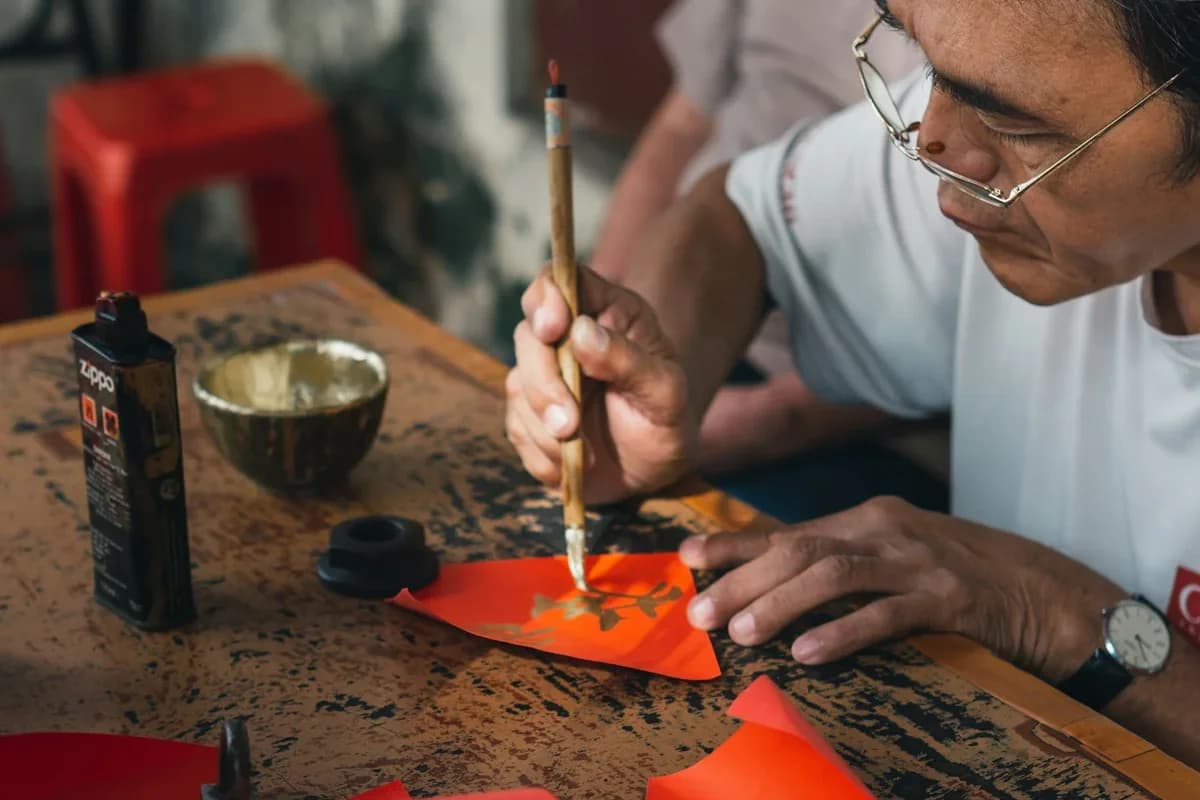 Chinese calligraphy master writing with brush and ink