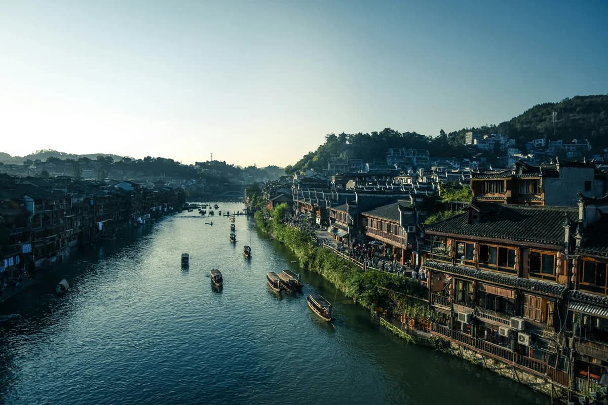 Historic Chinese riverside town at dusk