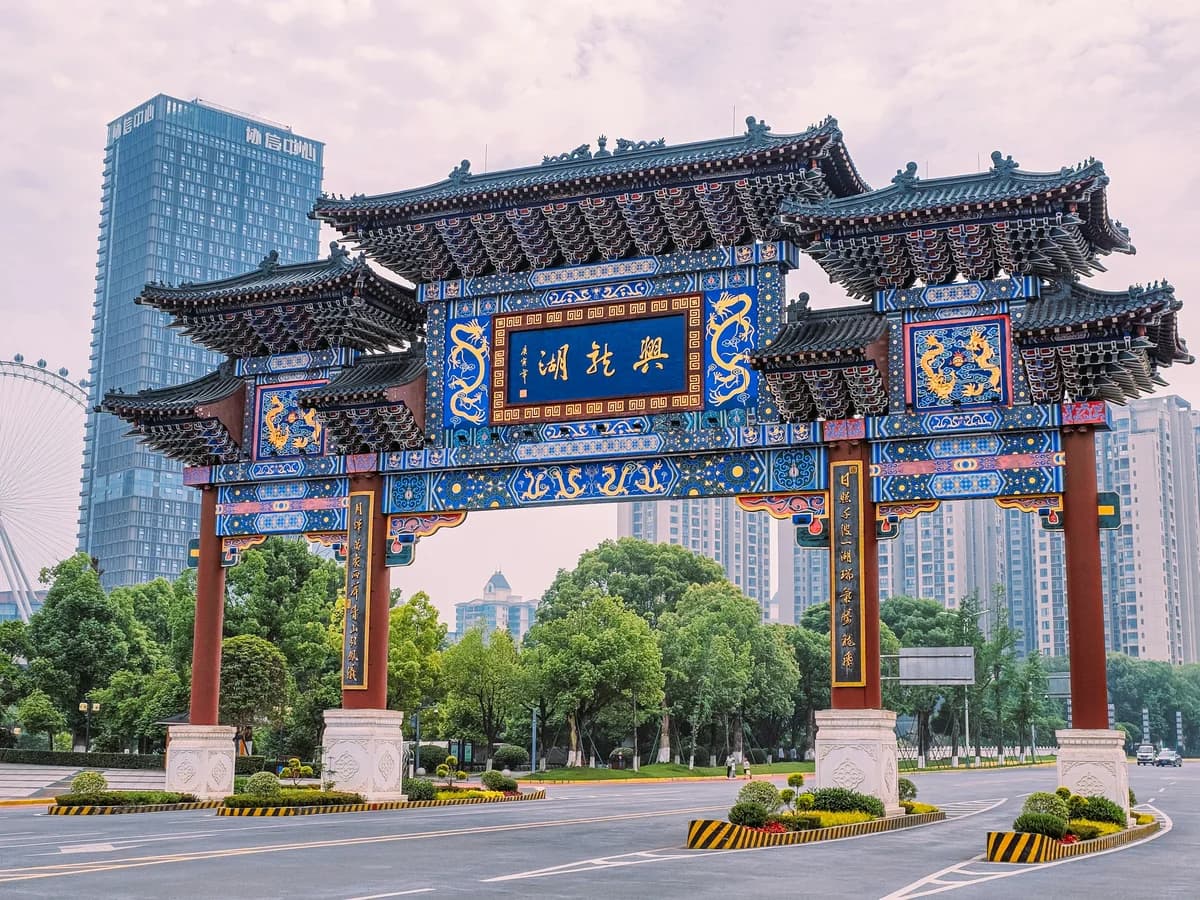Traditional Chinese paifang gate with dragon carvings