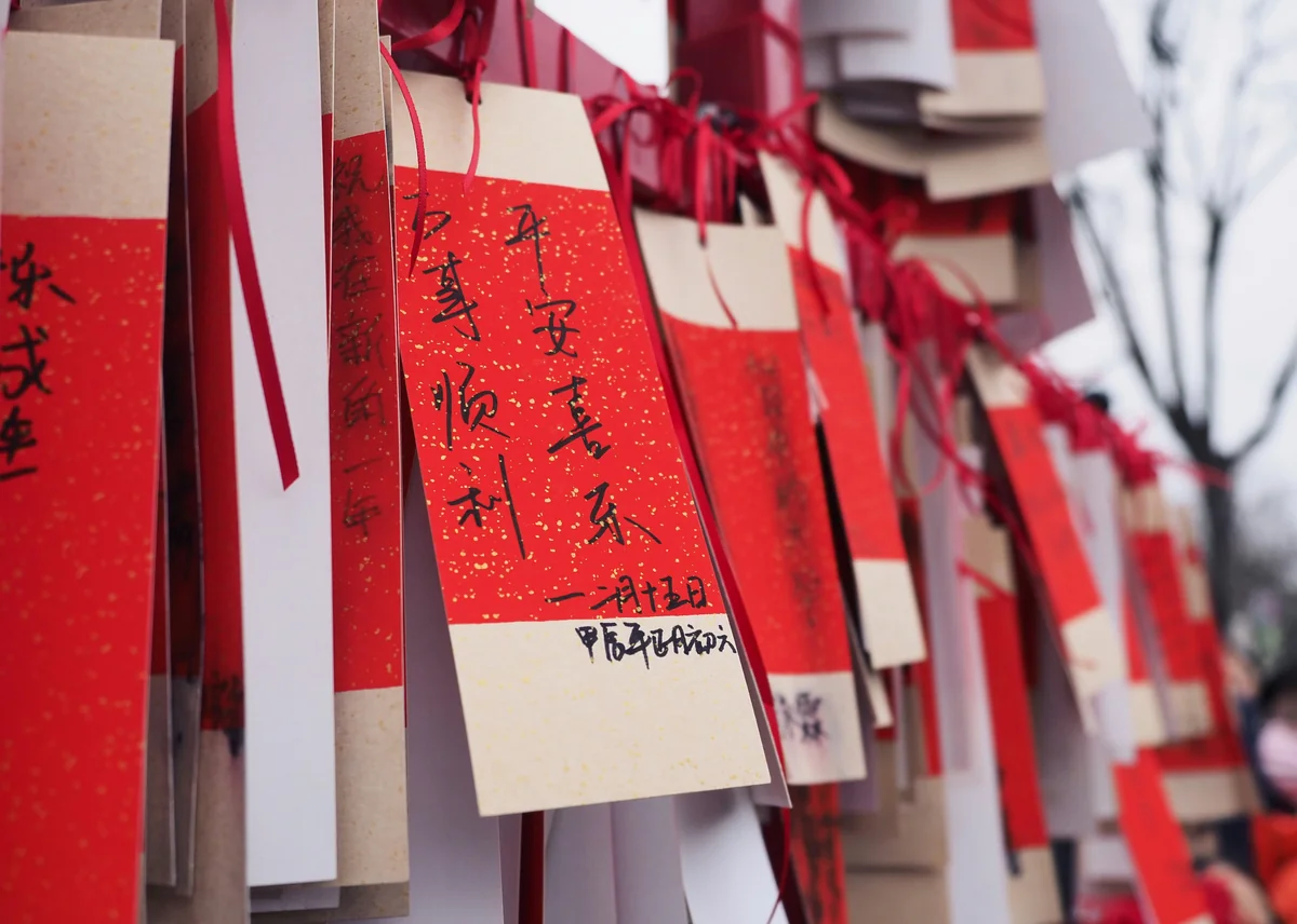 Traditional Chinese New Year celebration with red lanterns and festive decorations symbolizing fortune and prosperity in 2026