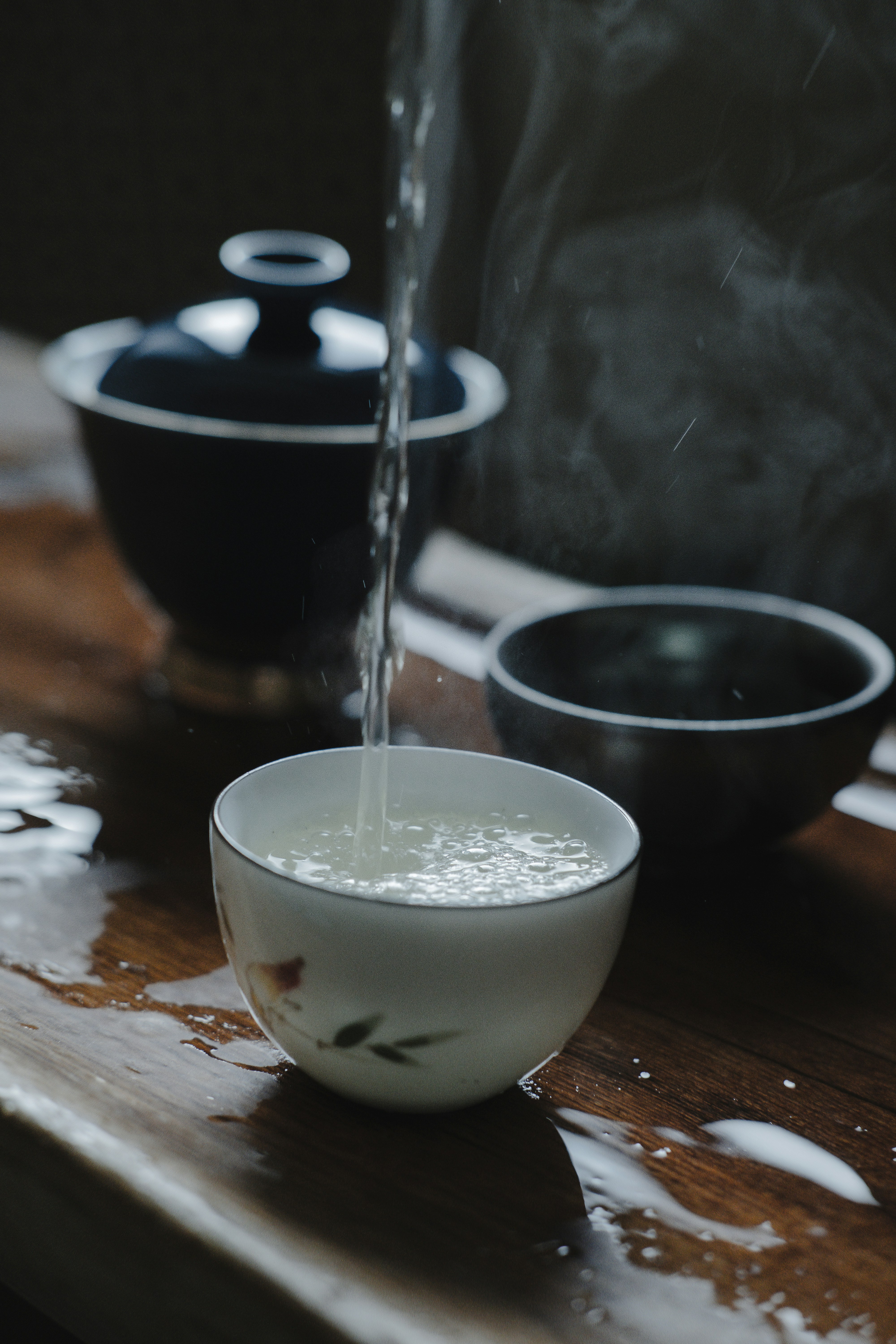A serene tea ceremony setting, representing the calm wisdom of Bazi.